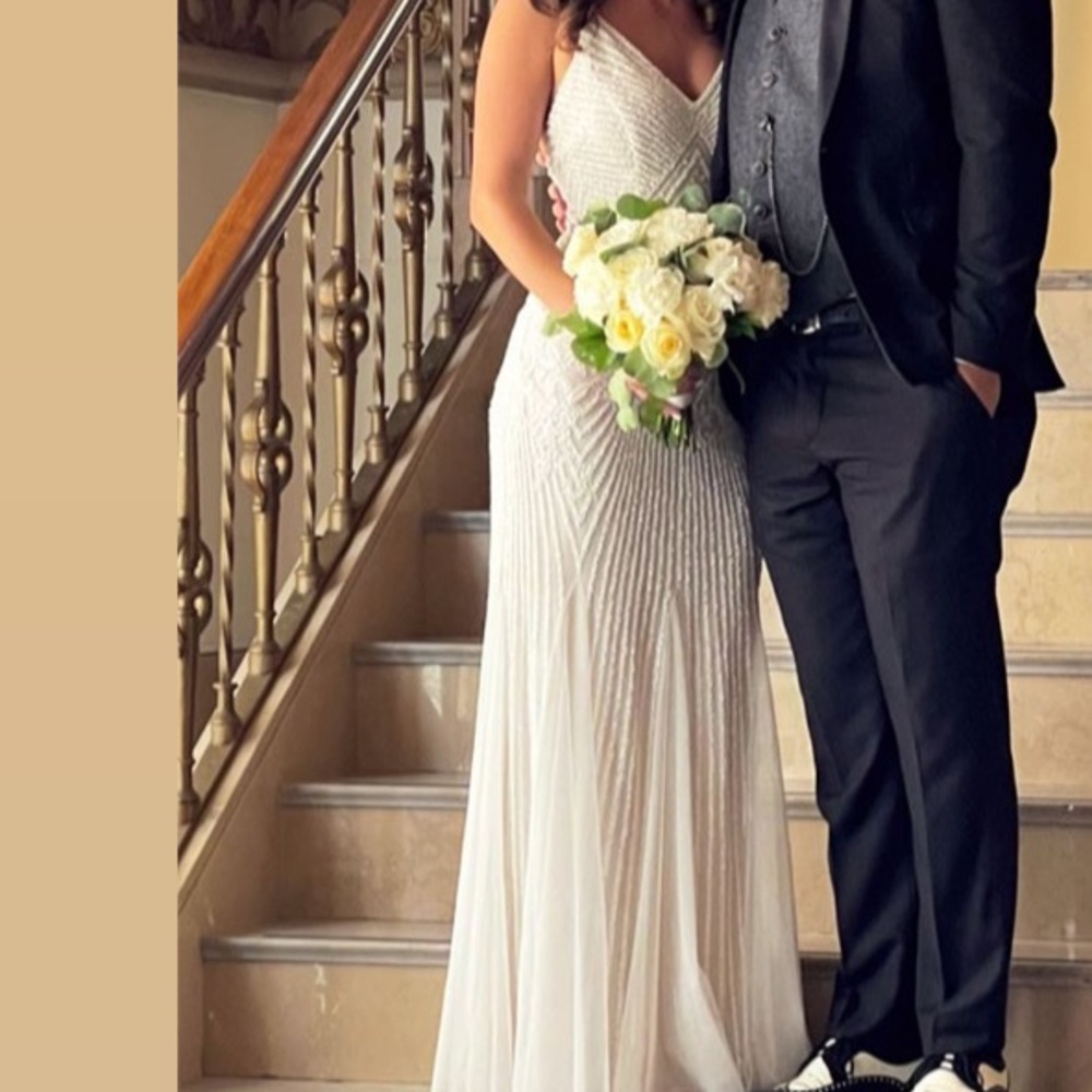 Ivory beaded sheath wedding gown